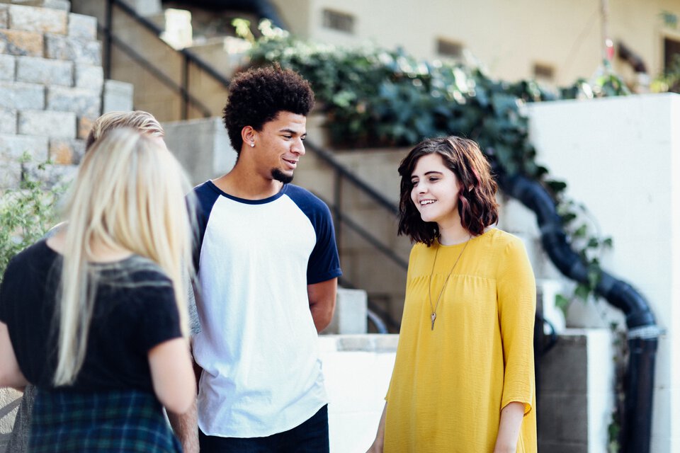 three-young-people-talking-960px